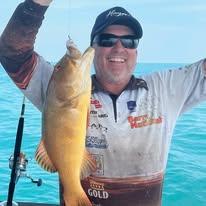 A proud angler with his catch
